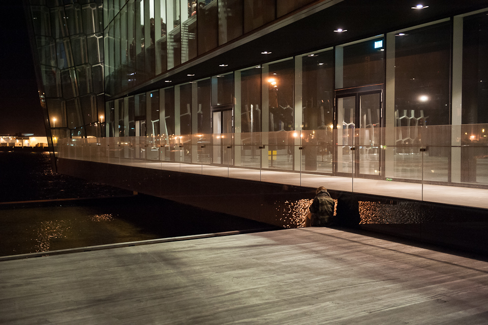 Woman outside Harpa Woman outside Harpa