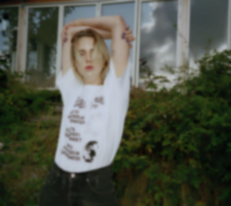 MØ drops new merch line in collaboration with Postevand to raise funds for clean water