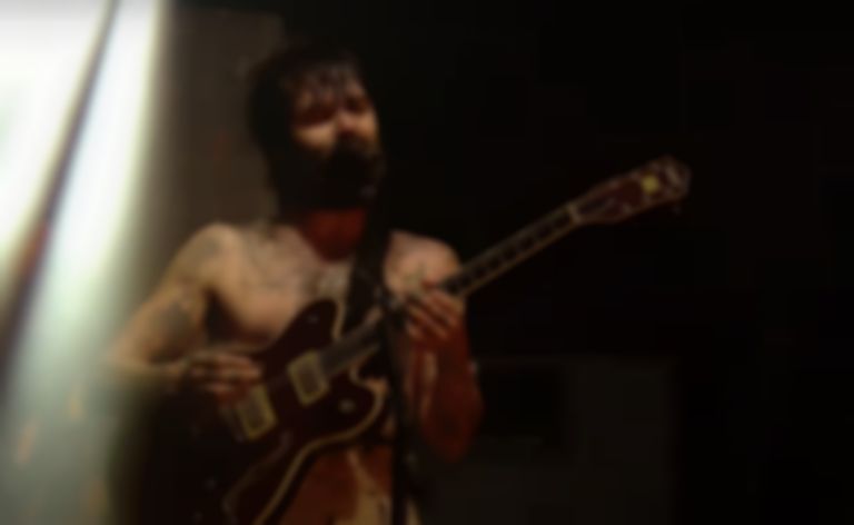 Biffy Clyro announce surprise project with new song “Unknown Male 01”