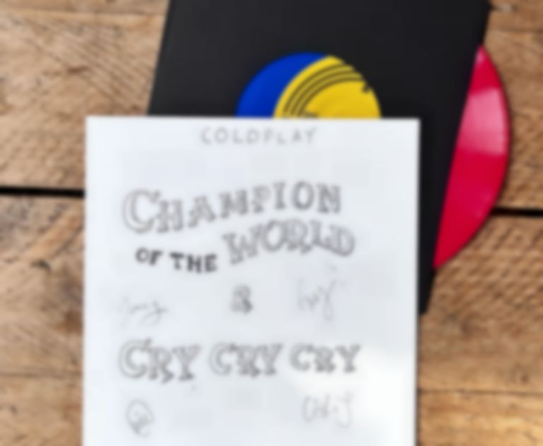 Coldplay donate one-of-one signed “Champion Of The World” vinyl to Tiny Changes charity
