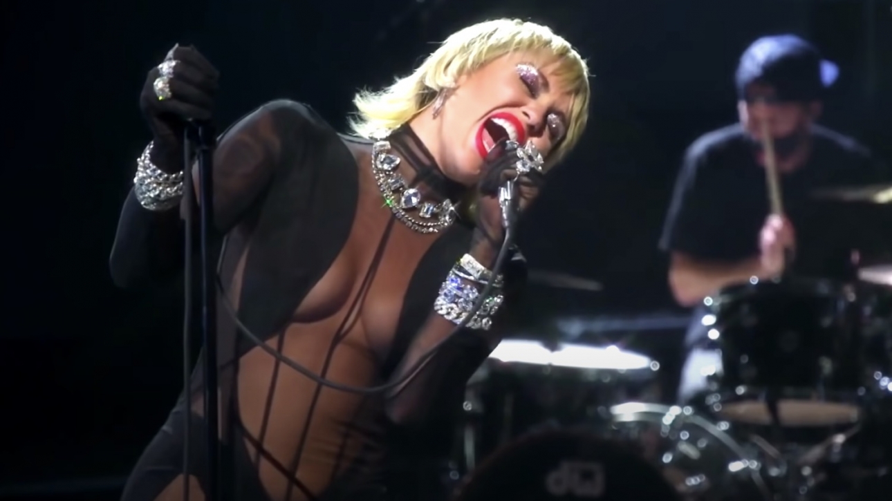 Miley Cyrus says “your wish is my command” after fan says girls want  “entire rock album”